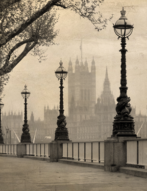 Sepia-toned view of street lamps, with Big Ben and Houses of Parliament in the distance.