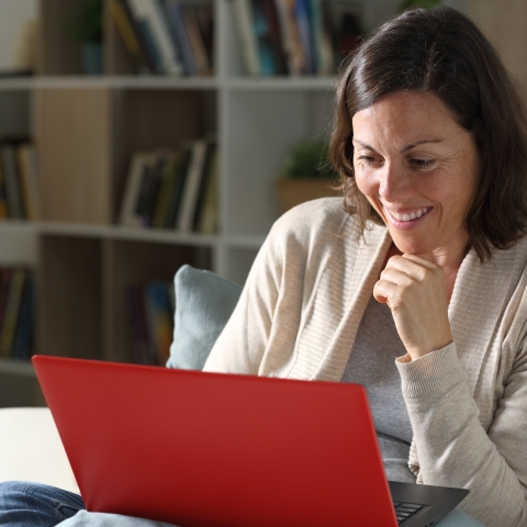 A photo of an adult learner participating in an online course.